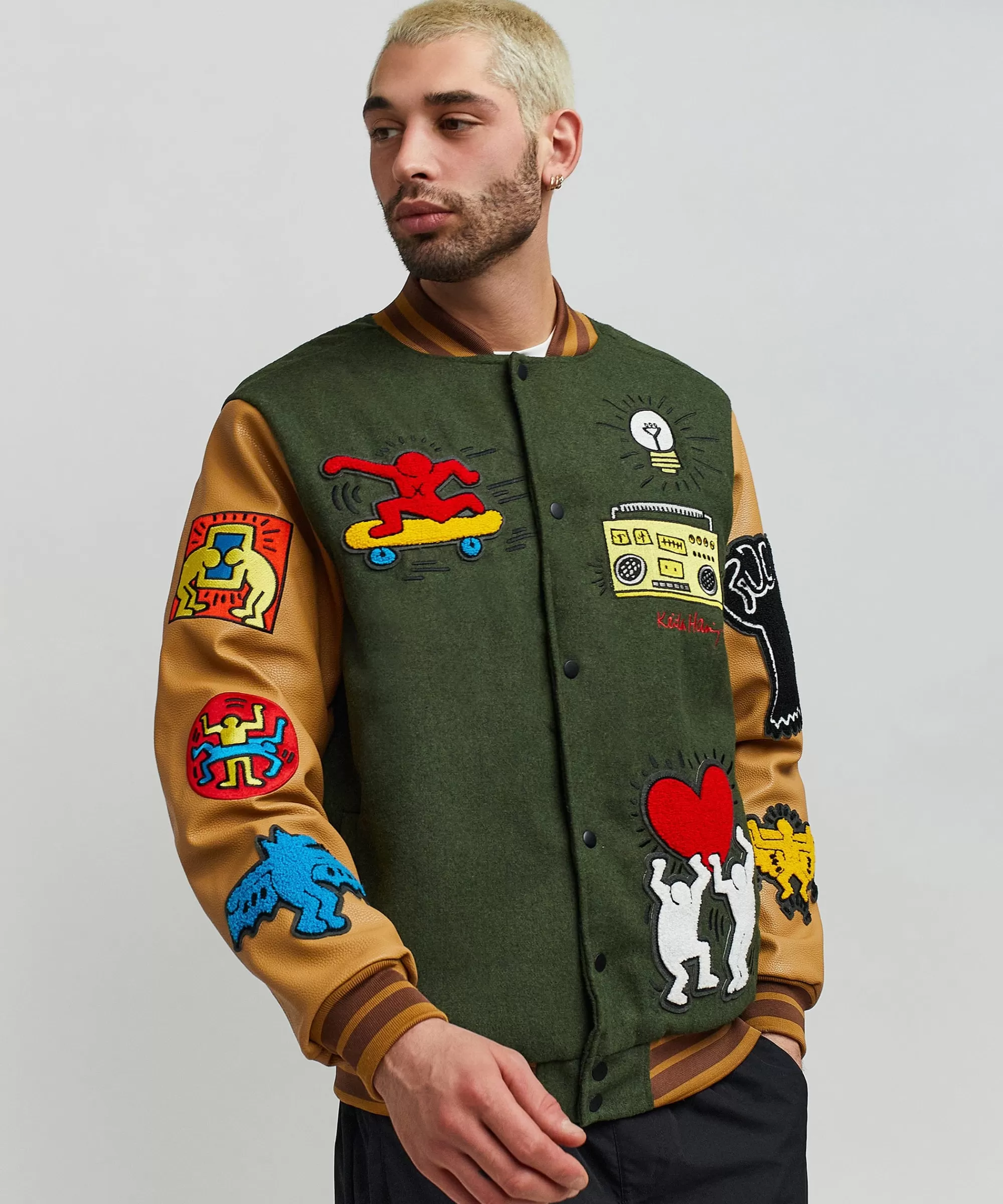 Shop Keith Haring Holding Hands Varsity Jacket Varsity Jackets